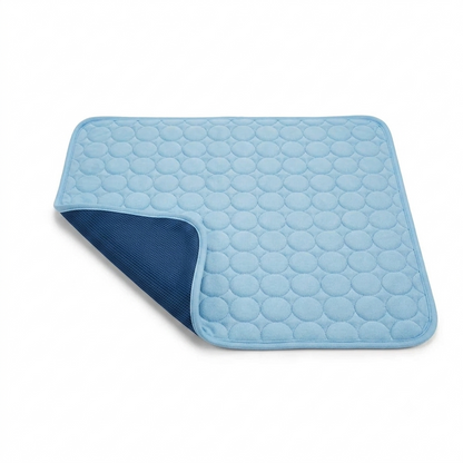 Cooling mat with a corner folded back showing the breathable mesh underside